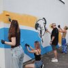 Від ескізу до муралу: студенти Фахового коледжу «Універсум» створили розпис фасаду ДЮСШ №10